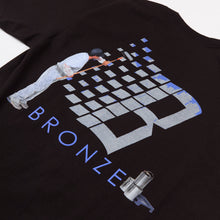 Afbeelding in Gallery-weergave laden, BRONZE 56K - &quot;ROLLER&quot; T-SHIRT (BLACK)

